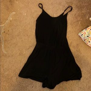 Black romper with spaghetti adjustable straps.